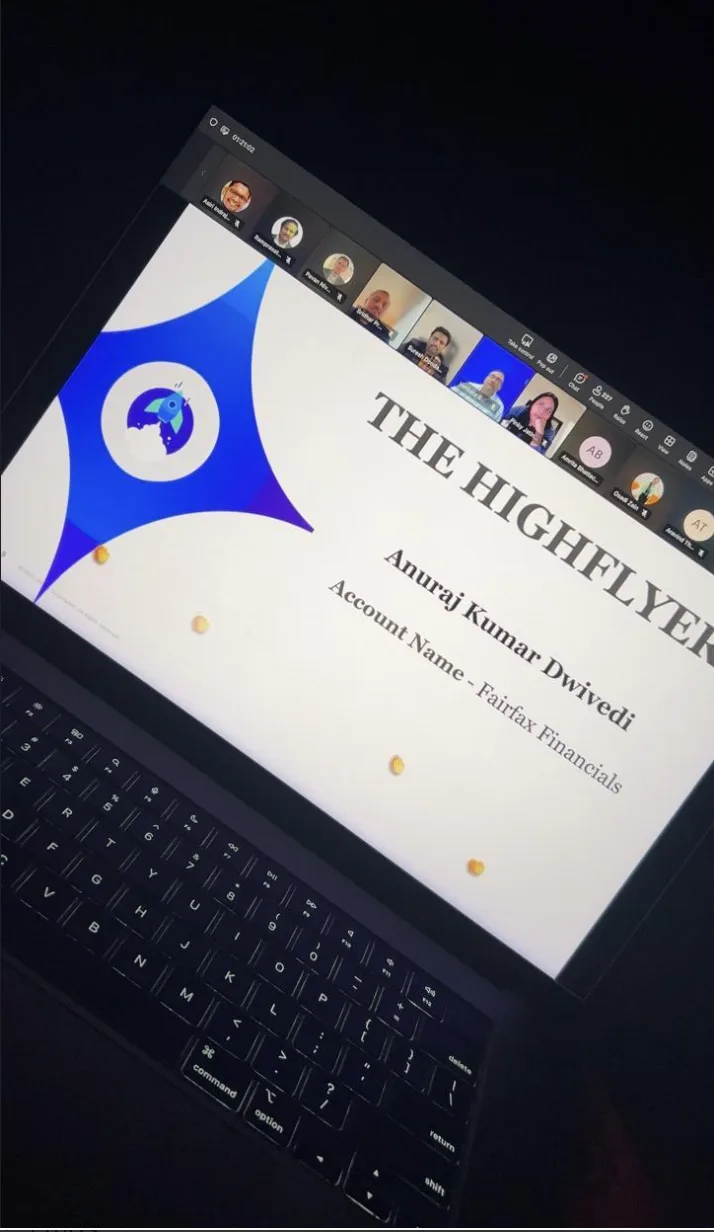 The Highflyer award slide with Anuraj's name, shown on a laptop during a video call